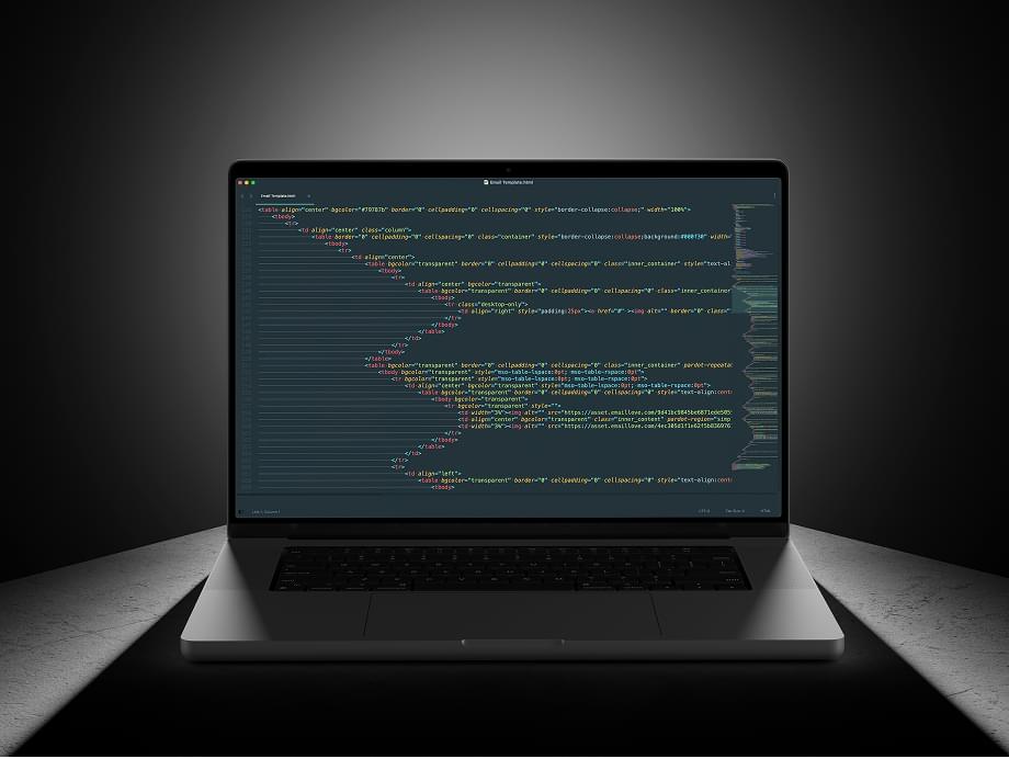 Email template code on MacBook laptop